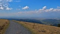 View from top of Belchen, one of the highest mountains in Black Forest, Germany, over Rhine valley and Vosges. Royalty Free Stock Photo