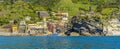 A panorama view towards the colourful Cinque Terre village of Vernazza