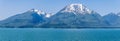 A panorama view towards the forested shoreline of the Gastineau Channel on the approach to Juneau, Alaska