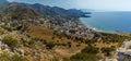 A panorama view of the town of Cefalu, Sicily from the Norman castle atop the mesa behind the town Royalty Free Stock Photo