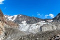 Panorama view of Tre-la-Tete glacier in French Alps, near the Domes-de-Miage towards Mont Blanc, on summer sunny day, blue sky Royalty Free Stock Photo