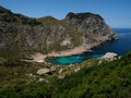 Panorama view of turquoise bright blue water tropical beach bay cove Cala Figuera Formentor Mallorca Majorca Spain