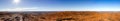 panorama view from the uluru after hiking up the Uluru with kata tjuta in the distance, ayers Rock, the Red Center of Australia,