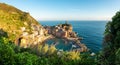 Panorama view of Vernazza and the ocean during sunset at Cinque Terre from above Royalty Free Stock Photo