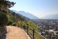 Panorama view of walking path Tappeiner promenade, Merano cityscape and mountains, South Tyrol, Italy