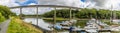 A panorama view of Westfield Pill showing boats moored and the road bridge at Neyland, Pembrokeshire, South Wales Royalty Free Stock Photo