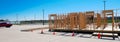 Panorama view wooden mobile home residential manufactured housing prefab house under construction framing at large outdoor parking Royalty Free Stock Photo