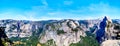 Panorama view of Yosemite Valley and the Sierra Nevada Mountains with the famous Half Dome rock formation on the right Royalty Free Stock Photo