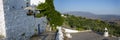 Panorama of a viewpoint of the town of Mairena in which you can see the roofs and chimneys of houses and the Alpujarra landscape