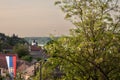 Panorama of the villae of Stari Slankamen with its church and a serbian flag over the riverbank of the danube river. Stari Royalty Free Stock Photo