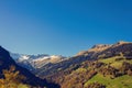 Panorama of the village of VÃÂ¤ttis and bridge against the background of the Swiss Alps at sunset. St. Gallen, Switzerland. Royalty Free Stock Photo