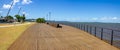 Panorama with walkpath, buildings and lake at Guaiba shore