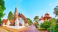 Panorama of Wat Pratu Pong with Chedi and green garden, Lampang, Thailand