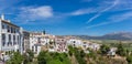 Panorama of white houses on the cliffs of historic city Ronda