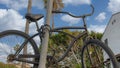 Panorama White puffy clouds Bicycle locked on a metal pole at La Jolla, California