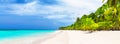 Panorama of white sandy beach with coconut palm trees in Caribbean sea, Dominican Republic Royalty Free Stock Photo