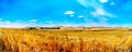 Panorama of the wide open farmland and distant mountains along the N3 between Warden and Villiers in the Free State province