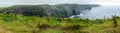 Panorama of Wild Cliffs of Moher near Galway Burren region, County Clare, Ireland Royalty Free Stock Photo