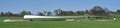 Panorama of a wind turbine blade on an agriculture field near the planned installation site, preparation for the construction of a Royalty Free Stock Photo