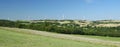 Panorama of windfarm over a hill