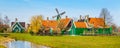 Panorama with windmill in Zaanse Schans, traditional village, Netherlands, North Holland Royalty Free Stock Photo