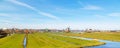 Panorama with windmill in Zaanse Schans, traditional village, Netherlands, North Holland Royalty Free Stock Photo