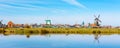 Panorama with windmill in Zaanse Schans, traditional village, Netherlands, North Holland Royalty Free Stock Photo