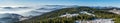 Panorama of winter High Tatras and many small hills Royalty Free Stock Photo