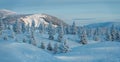 Panorama of Winter landscape of snow-capped mountains. Trees Covered With Snow In Sunny Day With Clear Blue Sky Royalty Free Stock Photo