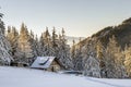 Panorama of winter mountains with houses of shepherds. Carpathians, Ukraine, Europe. Fantastic winter landscape. Creative Royalty Free Stock Photo