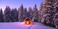 Panorama with wooden hut on the lawn covered with snow. Marry Christmas and New Year. The lamps light up the house at the evening Royalty Free Stock Photo