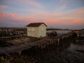 Panorama of wooden pier on stilts boat dock wharf port harbour Cais Palafitico da Carrasqueira Setubal Alentejo Portugal