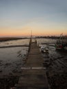 Panorama of wooden pier on stilts boat dock wharf port harbour Cais Palafitico da Carrasqueira Setubal Alentejo Portugal