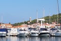 Panorama of a yacht marina in the town of Jezera in Croatia in the Dalmatia region. The ships moored in the port of a quiet fishin