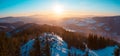 Panoramatic view on mountains from Kralicky Sneznik in winter at sunset.