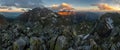 Panoramatic view over High Tatras mountains rocky peaks in Slovakia and Poland with remains of snow on sunset. Royalty Free Stock Photo