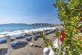 Panoramatic view of sun beds and sunshades on Haraki beach Rhod