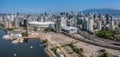 panoramic aerial city view of famous False Creek in Vancouver downtown with Cambie Bridge and BC Place Stadium Royalty Free Stock Photo