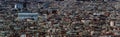 Panoramic aerial cityscape view of the barcelona cityscape showing densely crowded buildings towers and streets