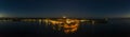 Panoramic aerial drone picture of the historic city Rovinj and harbor with full moon in Croatia during sunset Royalty Free Stock Photo