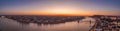 Panoramic aerial drone shot of Budapest by danube river with lights on before sunrise hour Royalty Free Stock Photo