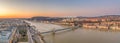 Panoramic aerial drone shot of chain bridge over danube river Buda castle before Budapest sunrise Royalty Free Stock Photo