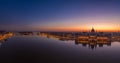 Panoramic aerial drone shot of Hungarian Parliament lights off sunrise in Budapest dawn Royalty Free Stock Photo