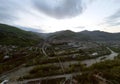 Panoramic aerial drone shot of Nehoiu, a traditional mountain village in Romania. Taken during an amazing sunset with Royalty Free Stock Photo