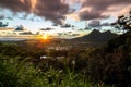 Panoramic aerial image from the Pali Lookout on the island of Oahu in Hawaii. With a bright green rainforest, vertical cliffs and Royalty Free Stock Photo