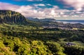 Panoramic aerial image from the Pali Lookout on the island of Oahu in Hawaii. With a bright green rainforest, vertical cliffs and Royalty Free Stock Photo