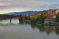 Panoramic aerial landscape view of Maribor old city. Ancient buildings with red tile roofs along the Drava River Royalty Free Stock Photo