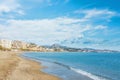 Panoramic aerial top view to Malaga city and La Malagueta beach, hotels, resorts, buildings and wavy Mediterranean sea on sunny d Royalty Free Stock Photo