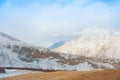 Panoramic aerial top view to winter Caucasian mountains covered Royalty Free Stock Photo