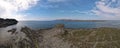 Panoramic aerial view of Asinara Island with the old Pelosa Tower  surrounded by turquoise seawater Royalty Free Stock Photo